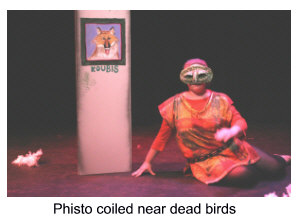 Phisto coiled by dead birds