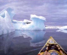 arctic kayak surrounded by ice flows