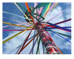 Beltane Maypole bedecked with garland and ribbons