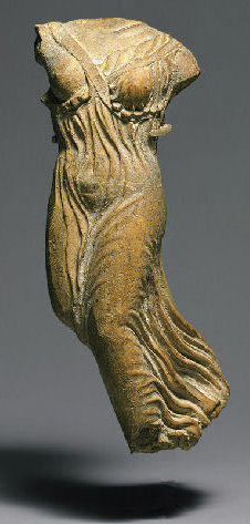 Statue of the legs and torso of a Greecian dancer