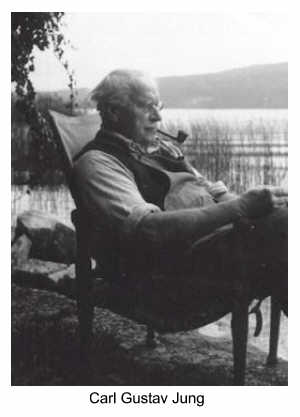 Carl Gustav Jung sitting in a chair, reading by the lake