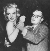 Marilyn Monroe dancing with Truman Capote