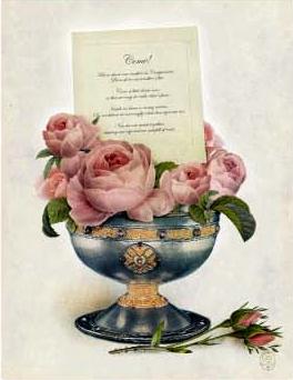 invitation nestled in a silver bowl of roses
